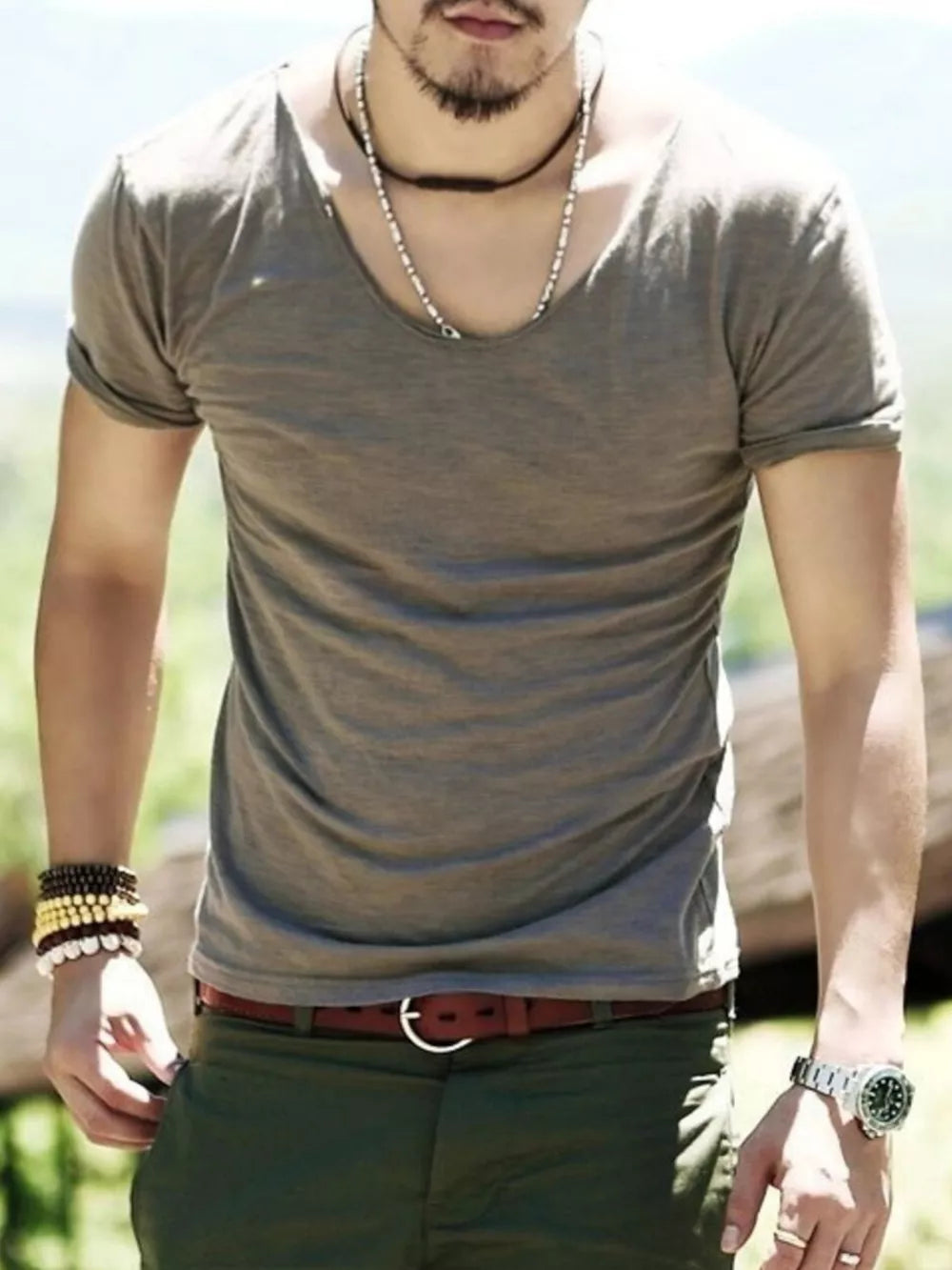 Men's Khakis relaxed scoop neck cotton tee with rolled sleeves.