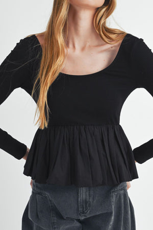 Black ribbed bodice peplum top with long sleeves and a scoop neckline.