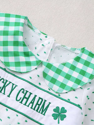 Baby set with green gingham collar, white fabric, embroidered "Lucky Charm" text and shamrock.