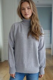 Gray speckled Donegal turtleneck pullover sweater with ribbed cuffs and hem.