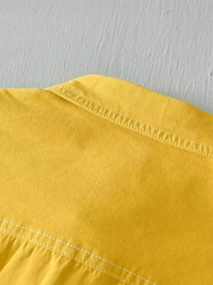 Yellow men's undershirt with contrast stitching detail.