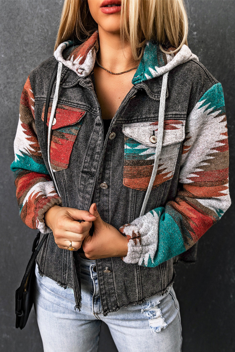 Southwestern print denim hoodie jacket with contrast sleeves and pockets.