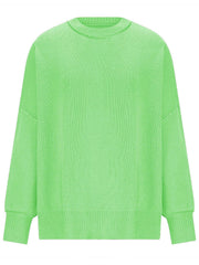 Oversized ribbed knit sweater in neon green with drop shoulders and crew neck.