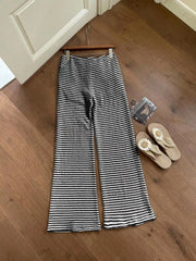 Black and white striped wide leg maternity pants with a crochet knit texture.