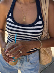 Chic striped halter cami top in blue and white knit with a cropped fit.