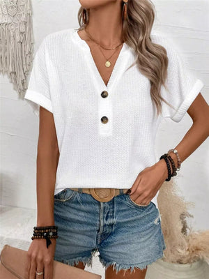 White waffle knit V-neck t-shirt with button detail and cuffed sleeves.