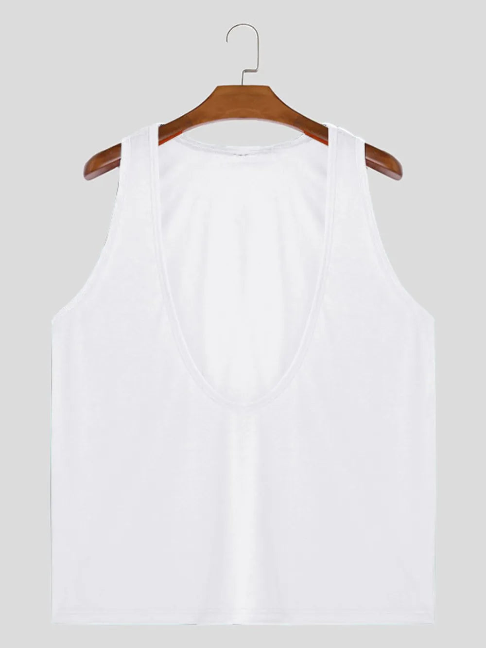White deep plunge tank top with a U-neckline and sleeveless design.