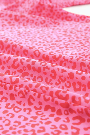 Pink leopard print blouse with smocked sleeves
