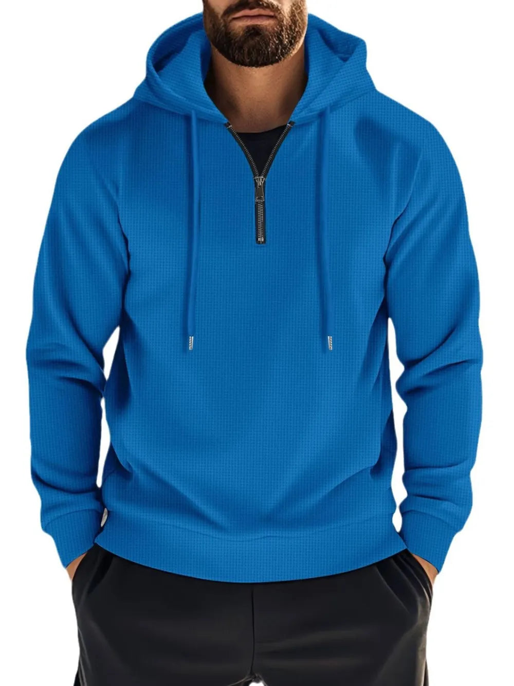 Blue waffle-knit quarter-zip hooded pullover with drawstring and zipper detail.