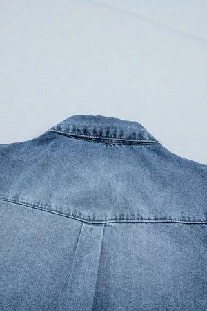 Denim shirt with collar detail and pleat on back yoke.