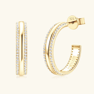 Gold pavé moissanite C-hoops in sterling silver with double row of sparkling stones.