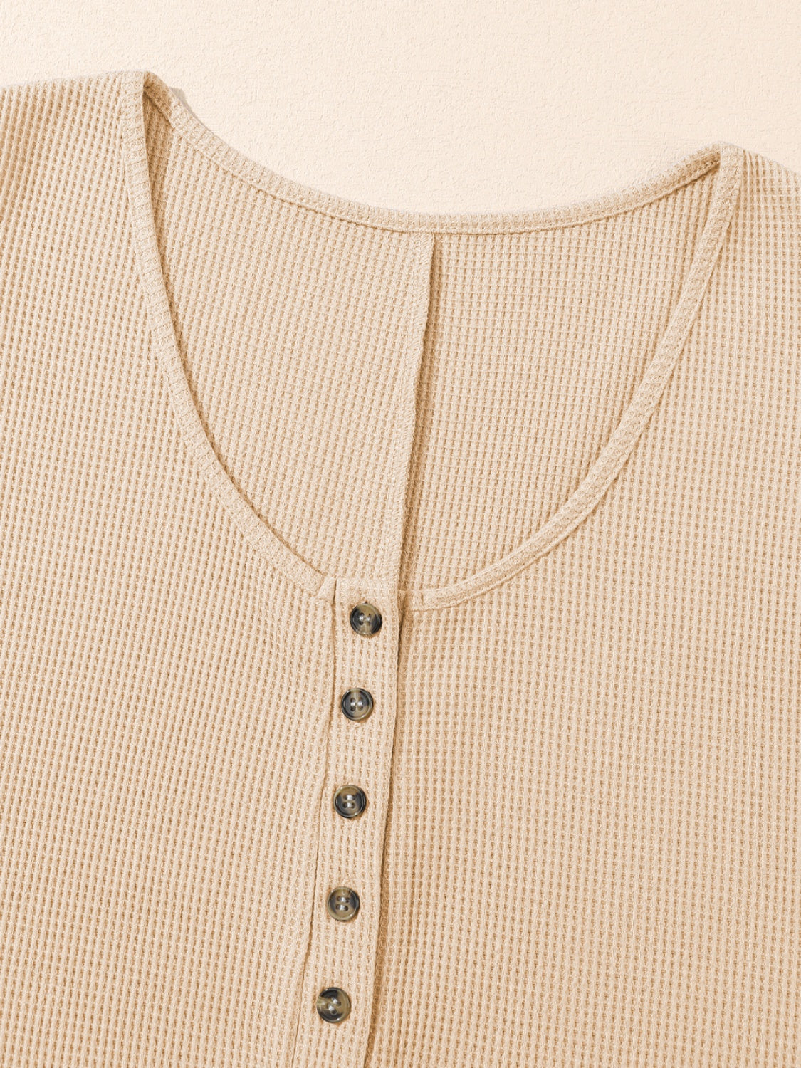 Waffle knit button-down romper in Camel with a scoop neckline and button details.