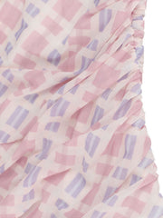 Ruched maxi dress with pink and purple geometric pattern, 100% polyester fabric