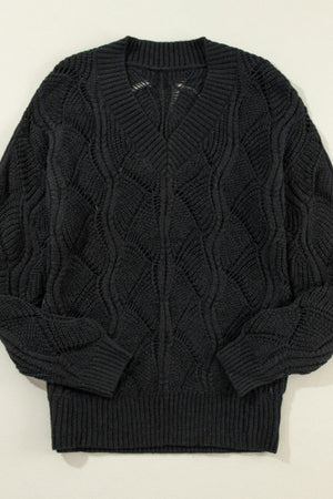 Black openwork knit V-neck pullover sweater with diamond pattern detail.