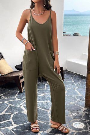 Army green relaxed drape pocket jumpsuit with V-neck and spaghetti straps.