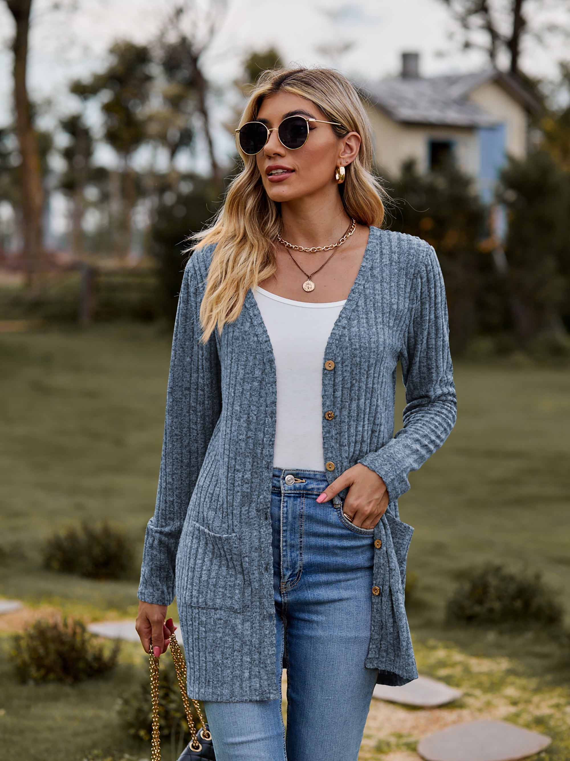 Longline ribbed knit button-down cardigan in Dusty Blue with pockets and wooden buttons.