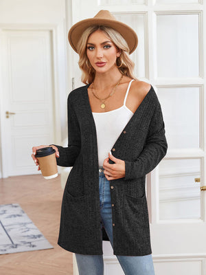 Black textured ribbed knit button-down cardigan with pockets and a relaxed fit.