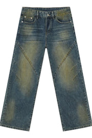 Panelled acid wash wide leg jeans in medium blue denim with distressed details.