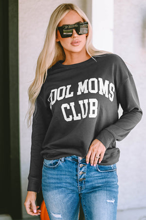 Charcoal crewneck sweatshirt with white "Cool Moms Club" graphic print, styled casually with jeans.