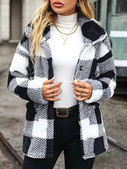 Cozy plaid sherpa trench coat with classic collar and button front.