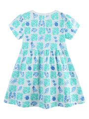 Cotton toddler dress with allover ocean print, featuring fish, shells, and sea creatures.