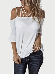 White blouson top with strappy neckline, cold shoulder, and flared sleeves.