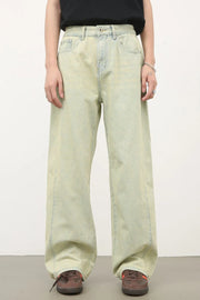 Acid wash wide leg denim trousers in sage green, featuring a relaxed fit and casual styling.