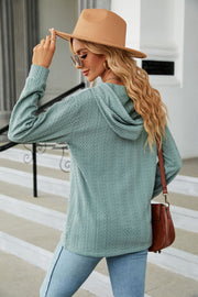 Textured knit hooded top in Air Force Blue with a relaxed fit.