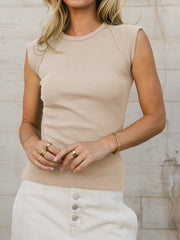 Structured ribbed shoulder tank top in tan with a crew neck and cap sleeves.