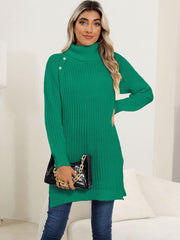 Green ribbed turtleneck tunic with pearl buttons on the shoulder, long sleeves, and side slits.