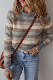 Neutral stripe crewneck knit sweater with ribbed cuffs and neckline.