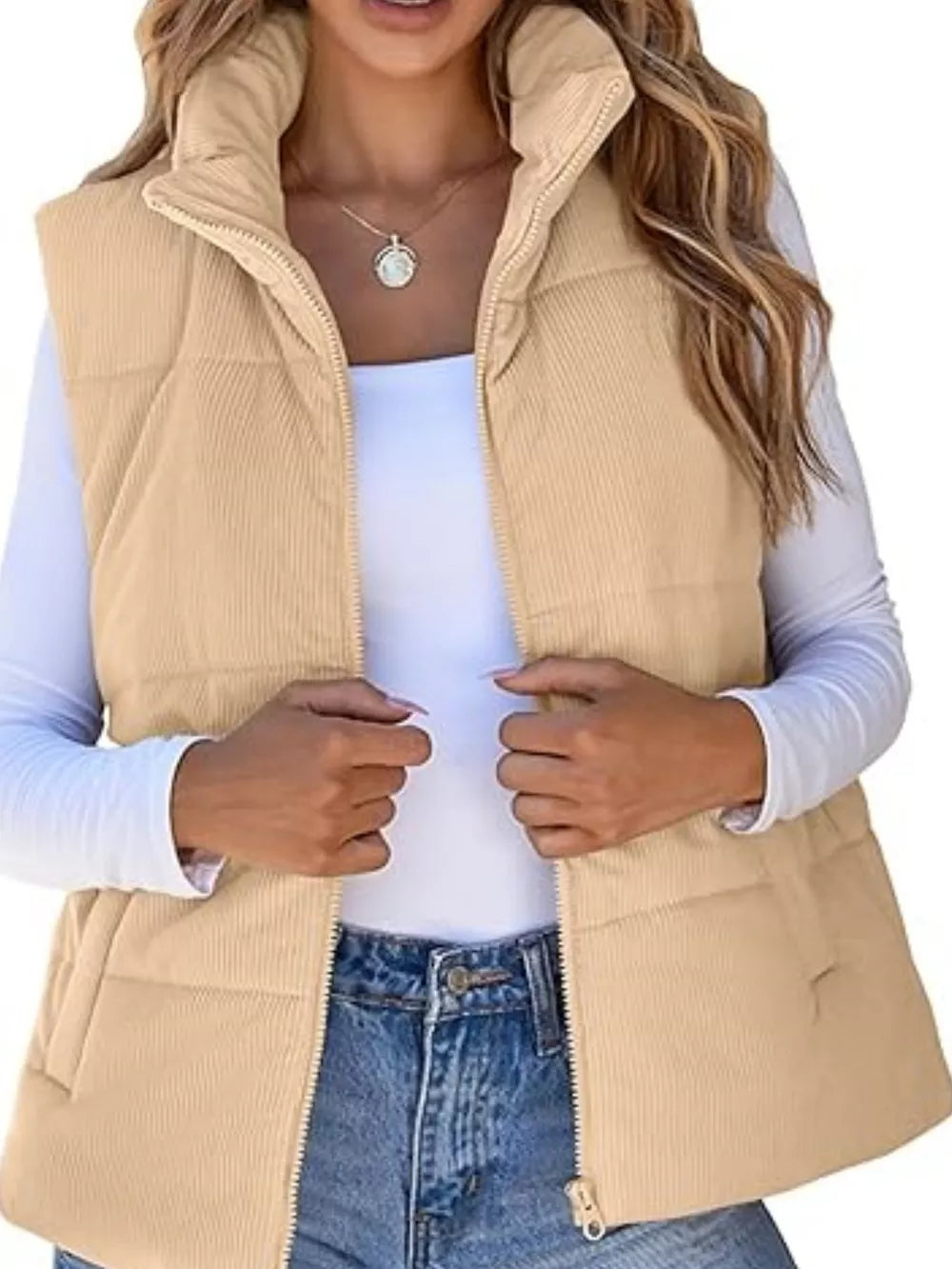 Apricot ribbed corduroy zip-up vest coat with stand-up collar and pockets.