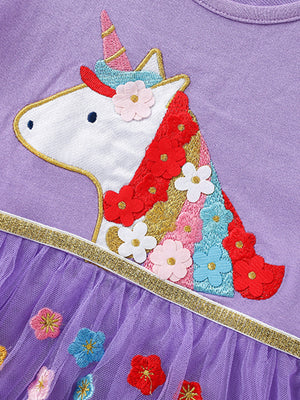 Purple toddler dress with unicorn appliqué and floral tulle skirt.