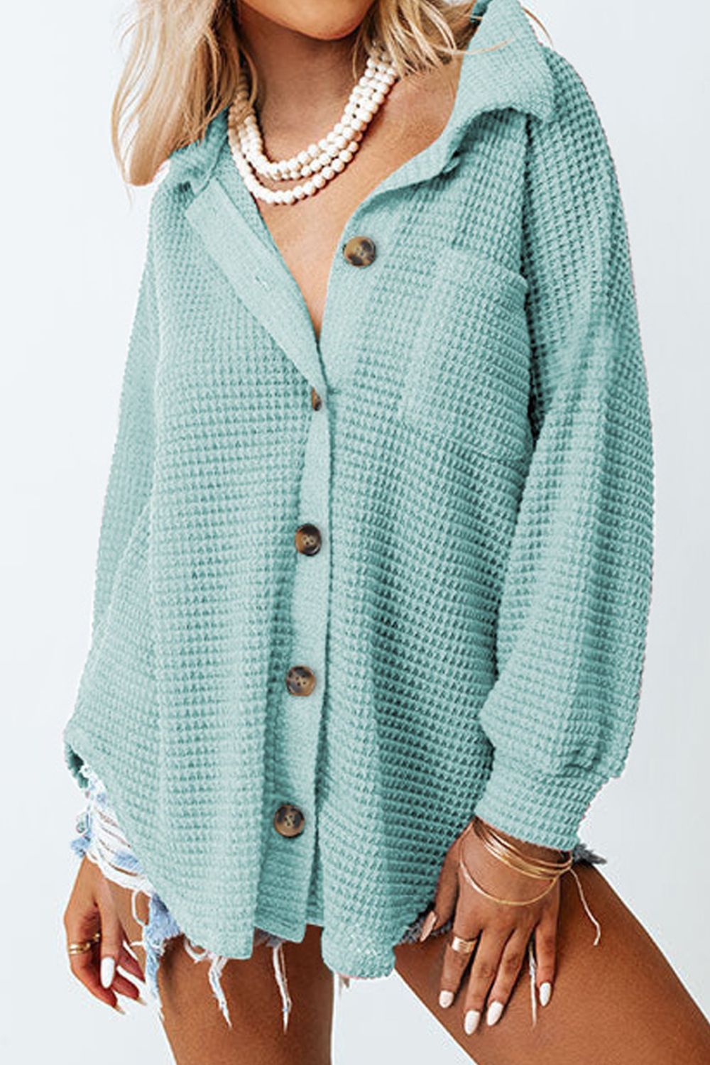 Light Green waffle knit button-down shirt jacket with chest pocket and button closure.
