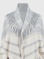 Textured fringe capelet in ivory and charcoal stripes with a shawl collar.