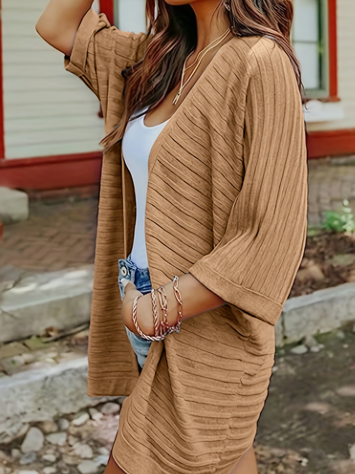 Camel ribbed sleeve cardigan with open front and 3/4 sleeves.