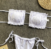 White ruffled bandeau bikini set with tie-side bottoms