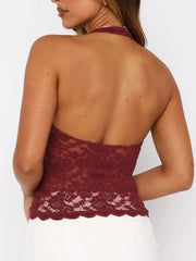 Burgundy floral lace halter top with a backless design and scalloped hem.