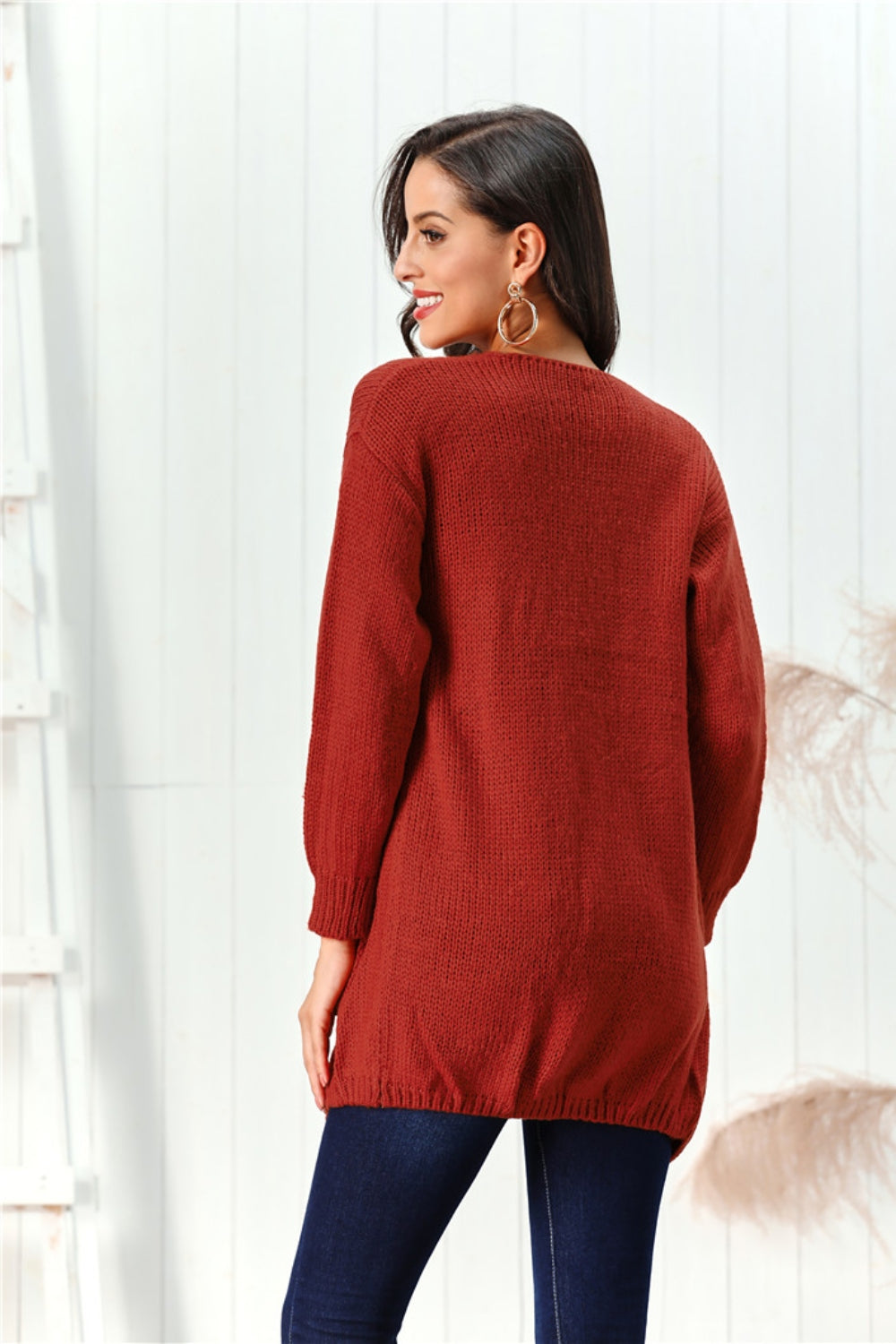 Deep Red knit open-front cardigan with long sleeves and a relaxed fit.