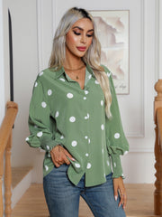 Light green polka dot blouse with shirred cuffs and button front.