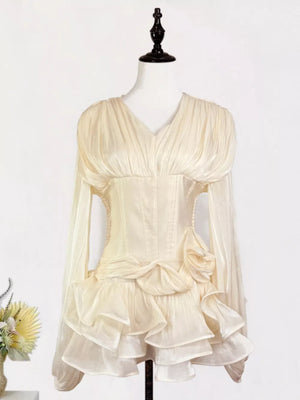 Apricot ruffled mini dress with corset waist, v-neck, long sleeves, and tiered skirt.