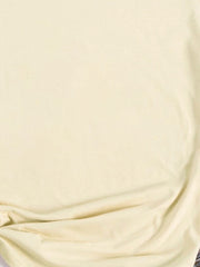 Light yellow oversized graphic tee with a soft cotton feel.