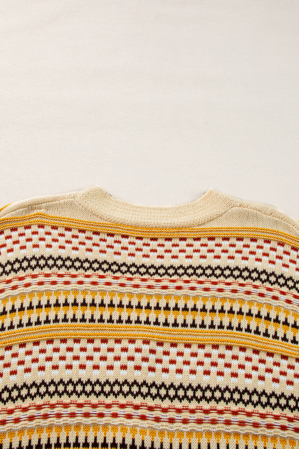 Geometric knit cropped cardigan in khaki with fair isle pattern and crew neck.