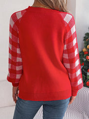 Red acrylic sweater with white gingham raglan sleeves.