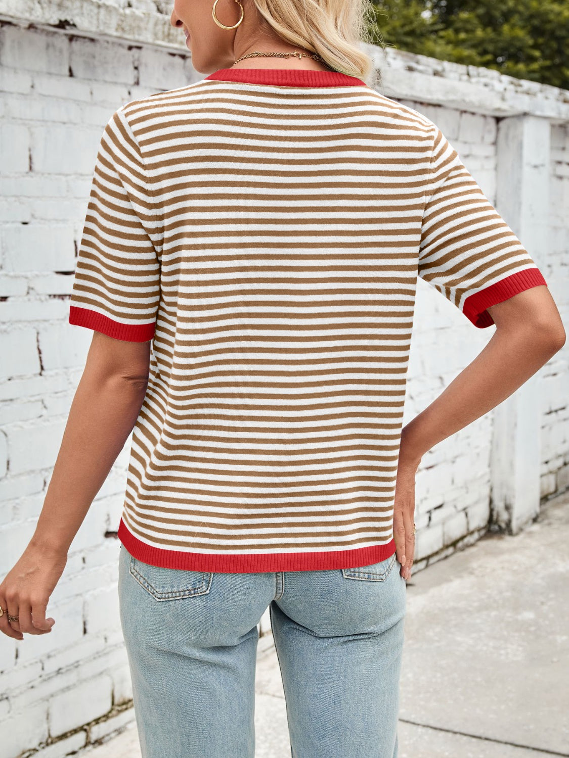Striped knit tee with red trim and collar, short sleeves, casual fit.