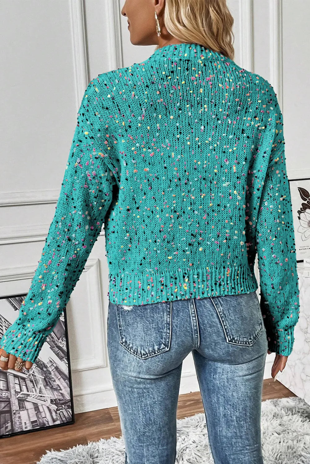 Confetti knit button-up cardigan in turquoise with a speckled multicolor pattern.