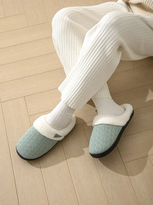 Cable knit shearling house slippers in Dusty Blue with cozy white trim.