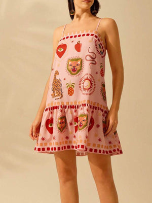 Pink ruffled mini dress with eclectic animal and heart print, square neckline, spaghetti straps.