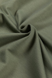Army green tunic fabric with a textured weave and soft drape.