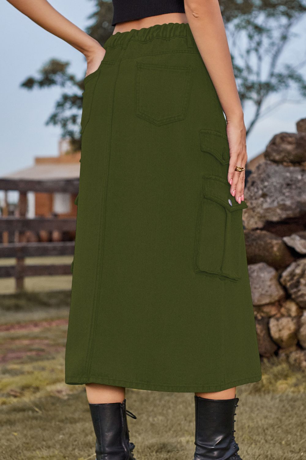 Army green denim midi skirt with cargo pockets and a slit, elastic waist